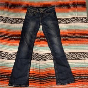 Buckle black boot cut jeans